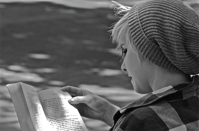 YOUNG WOMAN READING IN GAREMA PLACE