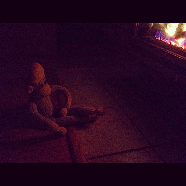 Week 30 - Illuminate; Mr. Sock Monkey enjoys the cozy fire #52photosproject