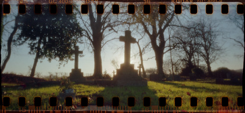 uk morning trees winter shadow england film cemetery grave graveyard sunrise 35mm memorial cross kodak hampshire pinhole gravestone marker 135 hursley c41 sprocketholes tetenal goldultra pp135v20