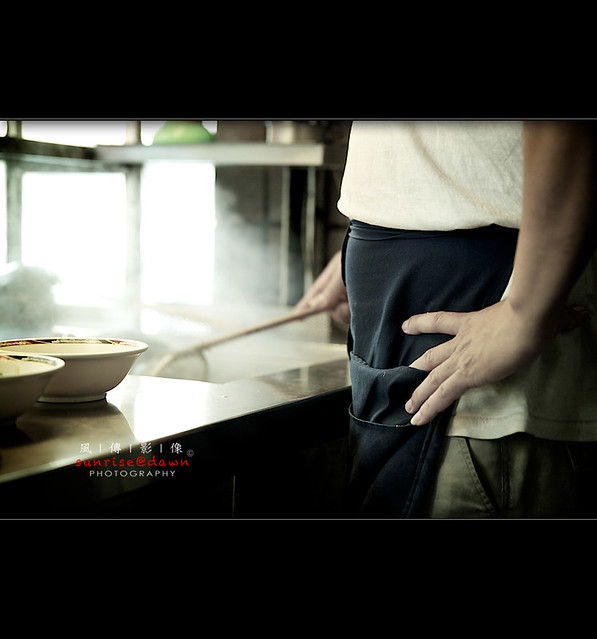 Man Cooking Noodles