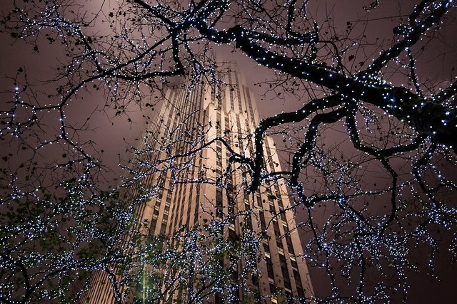 Rockefeller Center shrouded in fog, Christmas lights
