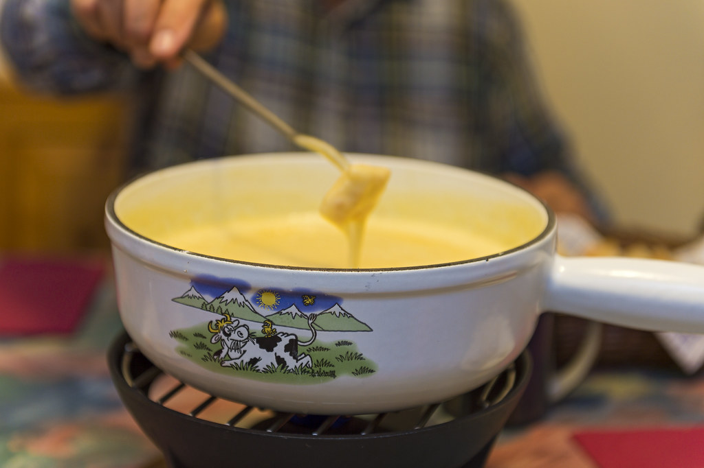 A delicious fondue... | Eating a delicious cheese fondue coo… | Flickr