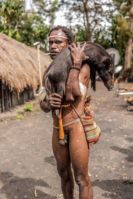 Man with Piglet
