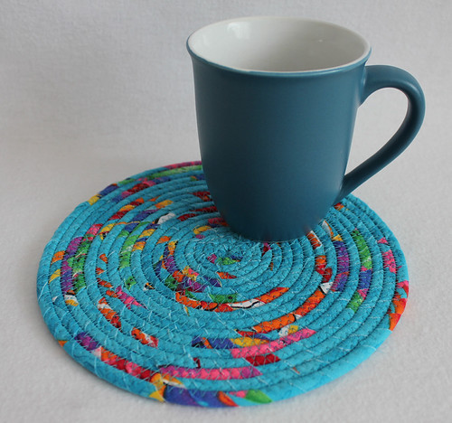 aqua blue colour splash round coiled mat | by PrairiePeasant