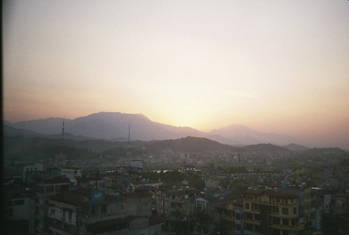 china city sunset sky mountains film 35mm buildings town asia southeastasia border vietnam laocai travelphotography