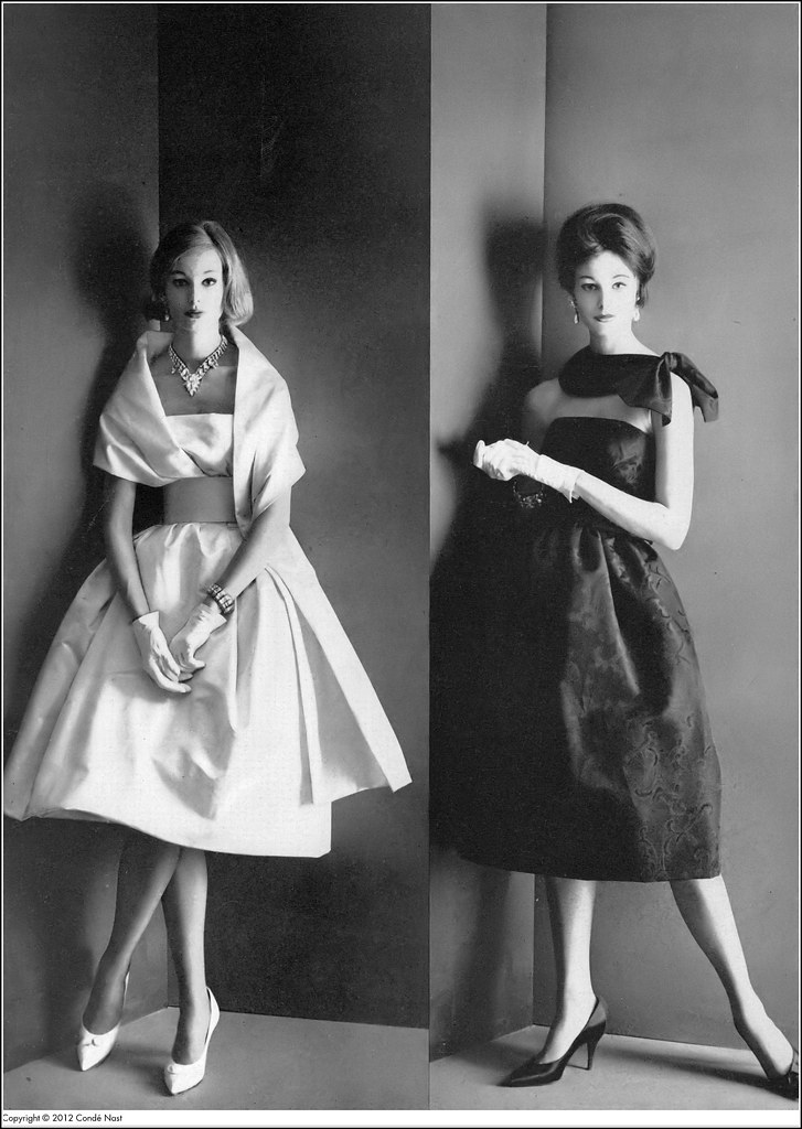 Monique (l) in shimmery satin dress with large stole fastened to waist from Cardin Boutique, model in black brocade from Guy Laroche Boutique, photo by Willy Rizzo, Vogue, February 15, 1960
