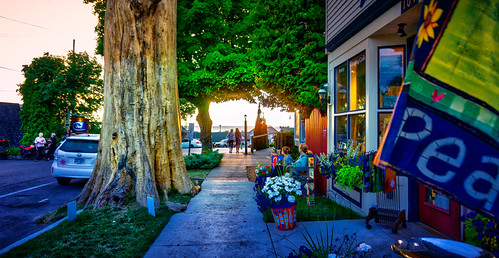 Peace by downstreamer, Sunset in Leland, Michigan.  There's a story about that big tree stump, the last of a massive cotton