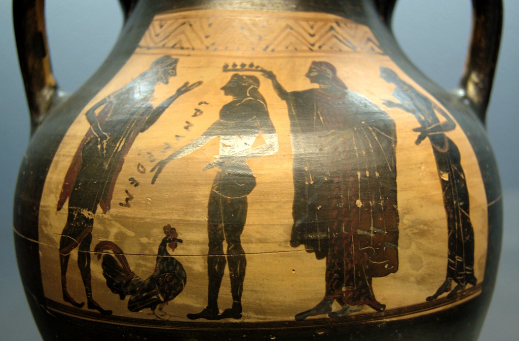 Zeus Ganymedes - Zeus the transformer. Staatliche Antikensammlungen 6009 Ganymede on Olympus, surrounded by Zeus who offered him a cock, a goddess crowning him and Hebe. Side A of an Attic black-figure amphora, ca. 510 BC.