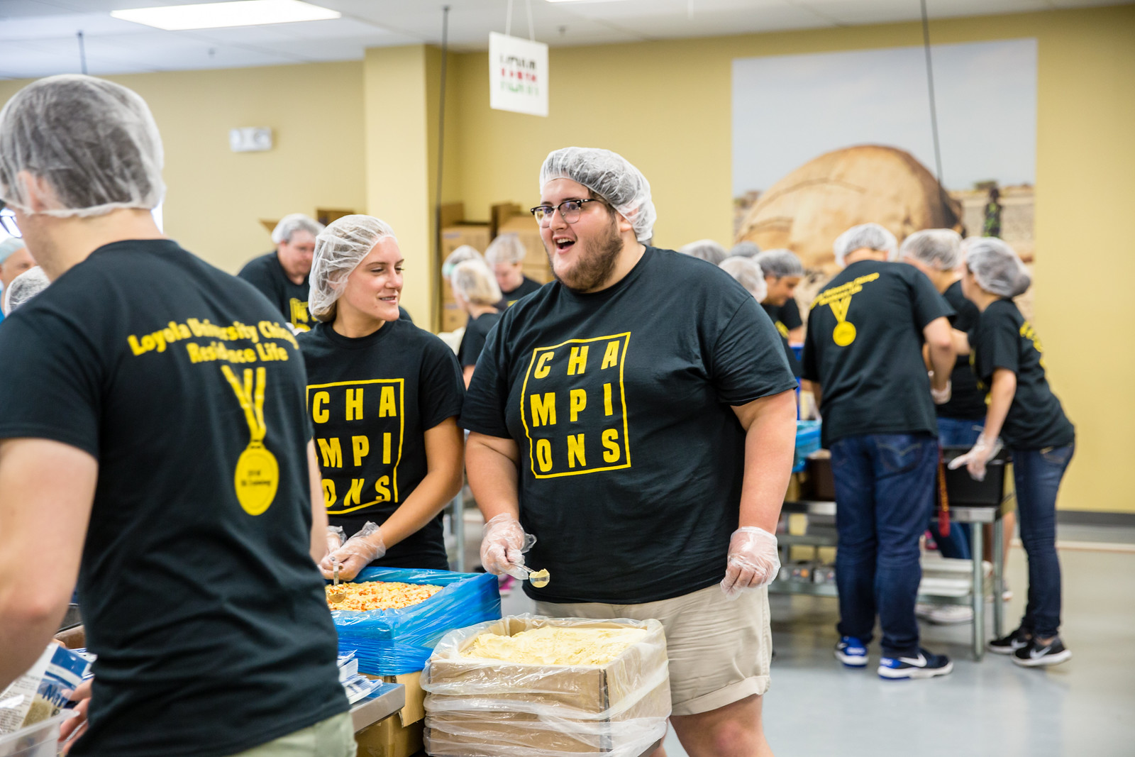 Loyola University Chicago ResLife volunteers at Feed My Starving Children