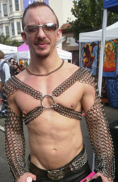 FOLSOM STREET FAIR RE-MIX ! (re-edited & re-cropped) CHAINED HUNK (SAFE PHOTO)