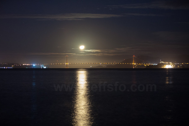 Moon setting over the Golden Gate Bridge