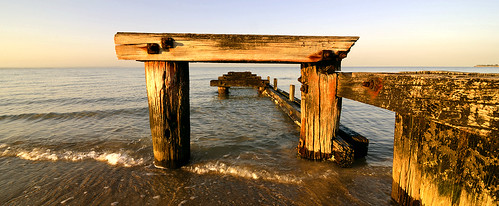 wood orange beach water port sunrise landscape gold bay pier sand rust waves review australia melbourne victoria lowtide phillip bathing bollards mentone goyne