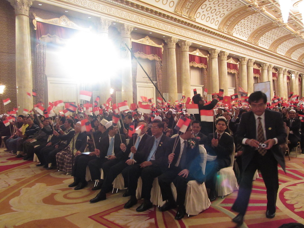 Audience waves ASEAN and 10 Member States flags during the… | Flickr