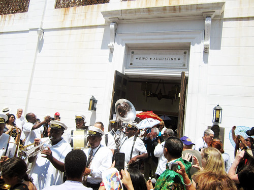 The Treme Brass Band emerges from St Augustine church after the Jazz Mass. Photo by WWOZ.
