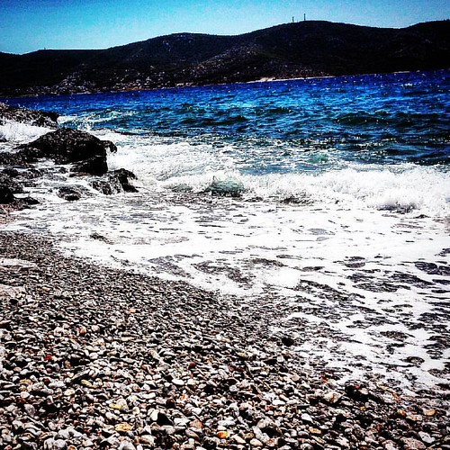Waves on the beach. Accommodation Rentals Galini Salamina Island Greece Ενοικιαζόμενα διαμερίσματα