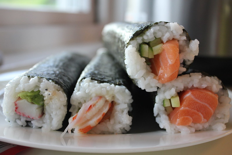 Uncut sushi rolls on a plate