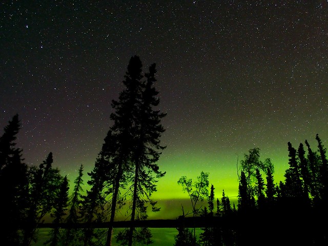 Night Skies with Aurora reflected on lake
