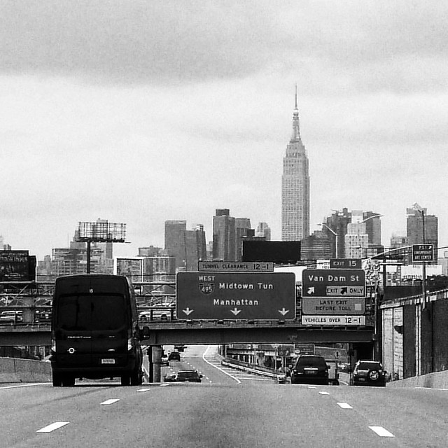 #driving on #longislandexpressway to #manhattan #newyorkcity #newyork #thebigapple #empirestatebuilding #skyscraper in #distance #blackandwhite