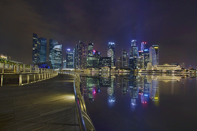 Singapore City Skyline Along Marina Bay Boardwalk at Night - HDR