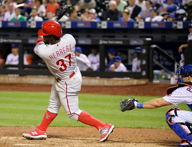 The Phillies' Odubel Herrera swings at a pitch in the 11th inning.