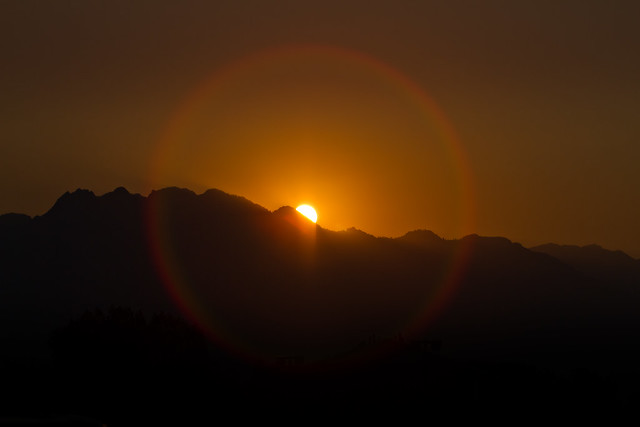Sunrise Halo over Mountain Range