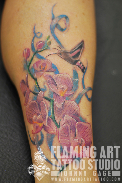 orchids and humming moth tattoo