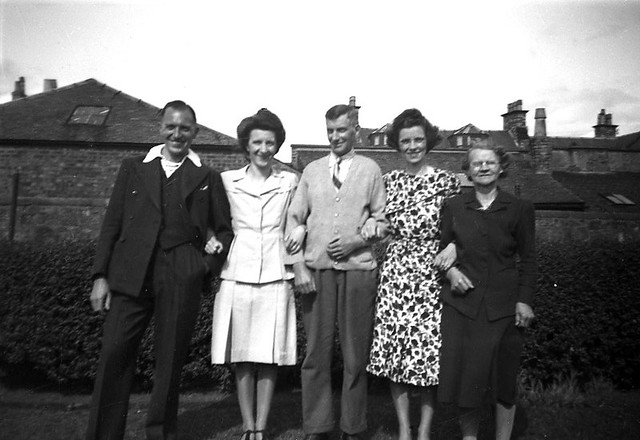 Arms locked in the garden 1940s
