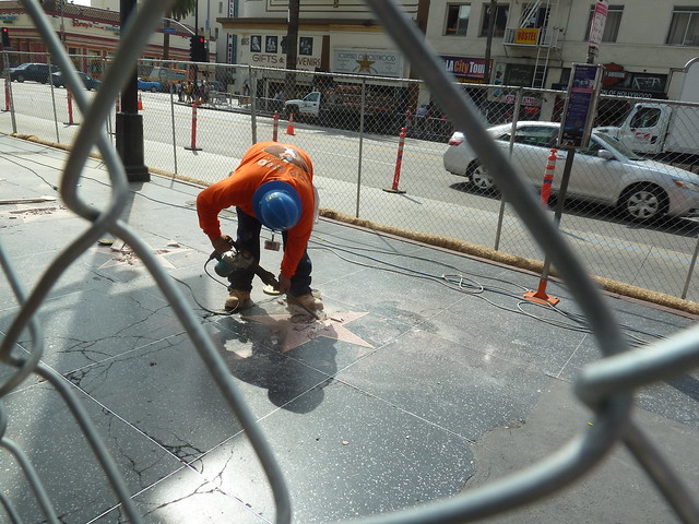 Workers were temporarily removing stars from the Hollywood Walk of Fame as the famous sidewalk gets a facelift.
