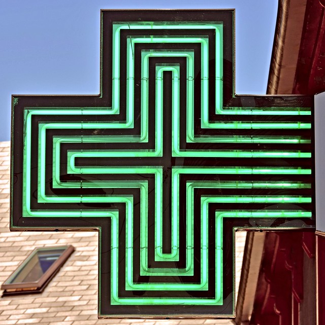 Neon green cross (pharmacy symbol)