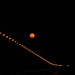 Luna roja sobre el puente Rosario-Victoria