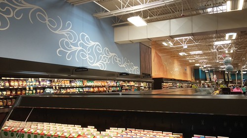 Marketplace décor along the back wall | by Retail Retell