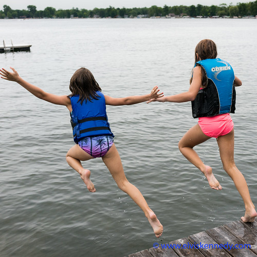 days summer leap two young girls summertime fun jumping lake sony rx1rm2 wwwelviskennedycom feet female free friends girl jump kellylake kennedy kid kids ladies landscape laugh laughing ledge legs lifejacket ocean outdoor outside pink play playing purple raft river rx1 rx1r rx1rii sisterts splash swim swimming swuisuit tide trees wake water wave waves wet wi wideangle wild wisconsin woman women youngster dive elvis bellyflop arms carefree cousins