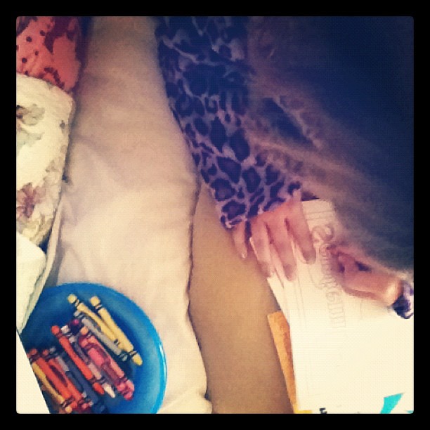 Coloring together in bed on a crisp and drizzly autumn morning