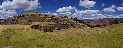 travel peru andes mountains landscape sky building ancient ruins wall cusco sacsayhuaman grass tree cloud