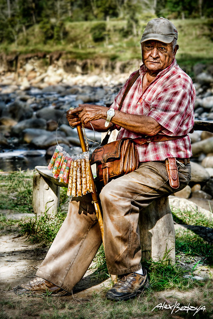 Confitero en el rio - Old candy seller near the river