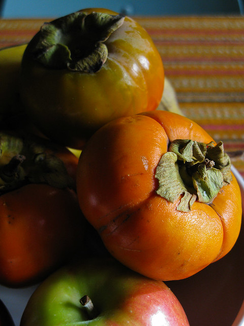 Persimmons and an Apple