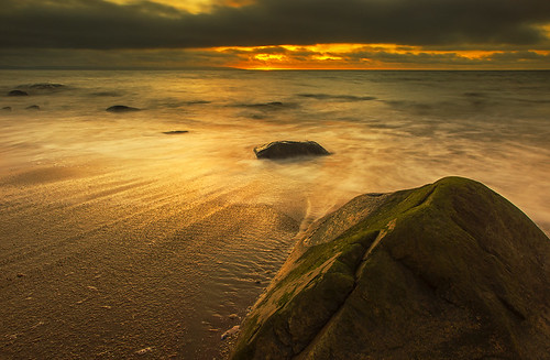 ocean sunset sea beach water stone clouds coast sand sweden halland mygearandme