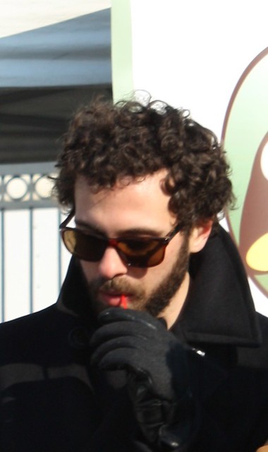 Curly Haired Man at the Market