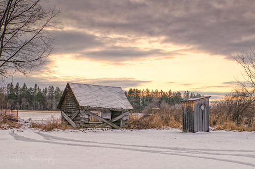 old pink sunset sky clouds shed abandon outhouse deserted