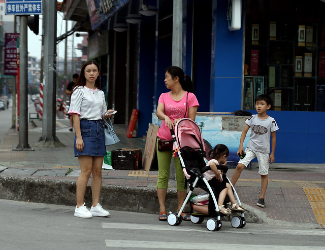 Family on Street Corner