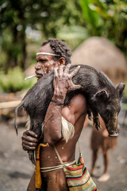 Man with Piglet