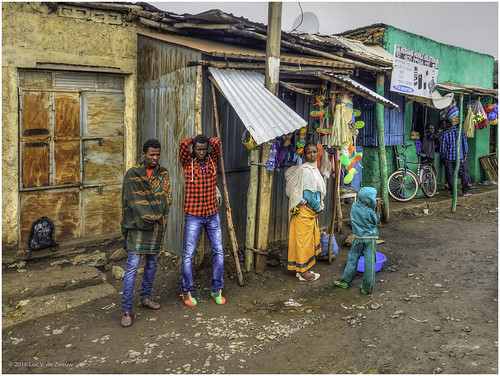aksum bicycle ethiopia man people shop street tigray