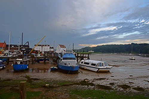 suffolk rurallandscape riverside tidal boats quay eastanglia riverdeben masts reflections sunshine mud dock
