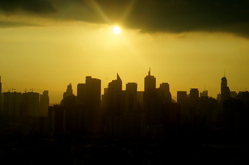 sunset urban sun sunrise smog skyscrapers philippines manila makati