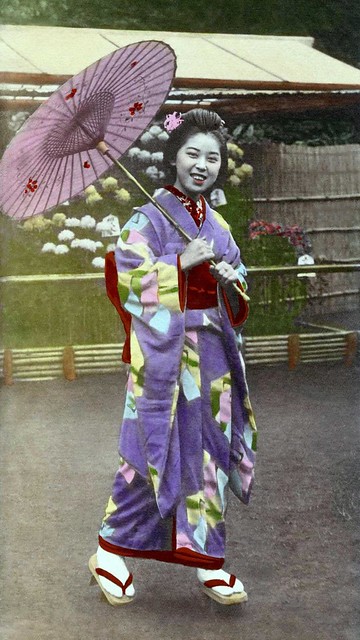 GIRL WITH UMBRELLA AND SMILE