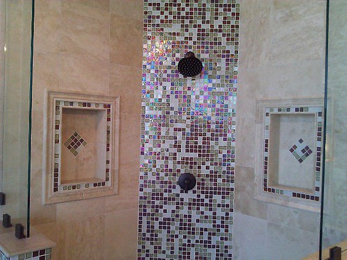Travertine tile and glass designs