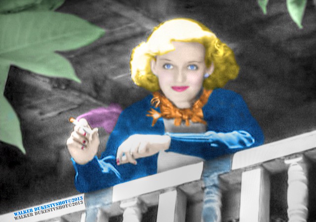 Candid Shot of Young Movie Star Bette Davis Enjoying a Cigarette Break During Filming