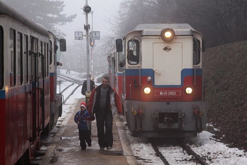 Father and son ride the Children's Railway