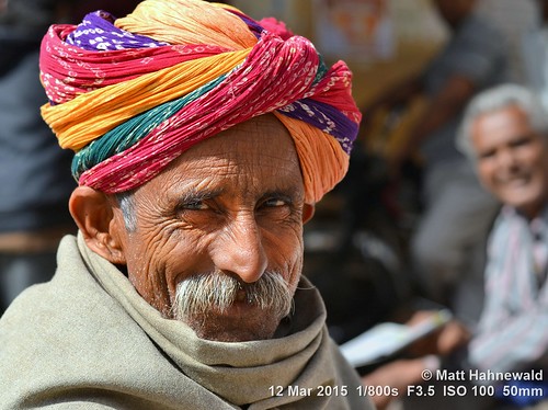 pagari moustache primelens portrait cultural character turban travel male posing authentic street eyes traditional matthahnewaldphotography face facingtheworld man old horizontal head india indian jaisalmer nikond3100 outdoor rajasthan 50mm expression headshot nikkorafs50mmf18g colourful colour seveneighthsview emotional closeup consensual lookingatcamera sunlight
