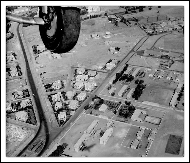 The view from an Imperial Airways Handley Page HP42 aircraft ( note shadow on ground ) just overflying the perimeter of the aerodrome  at Heliopolis, Egypt - circa 1932
